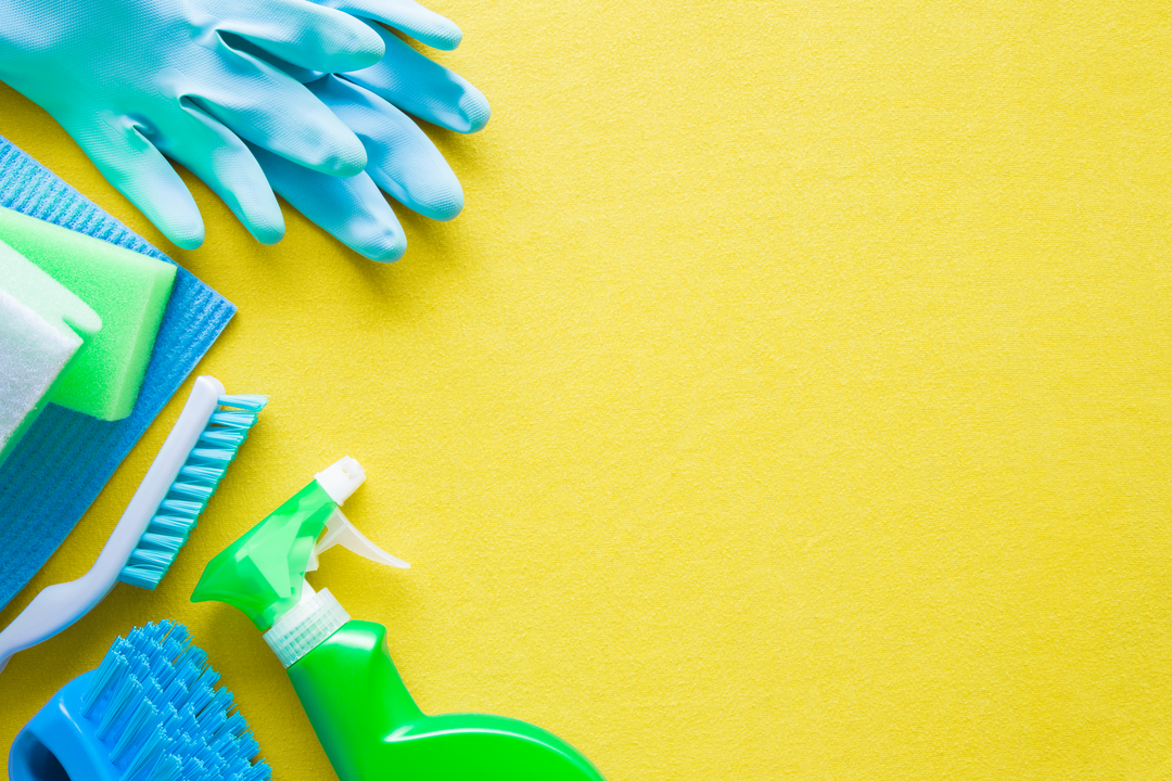 Cleaning products on a yellow graphic background