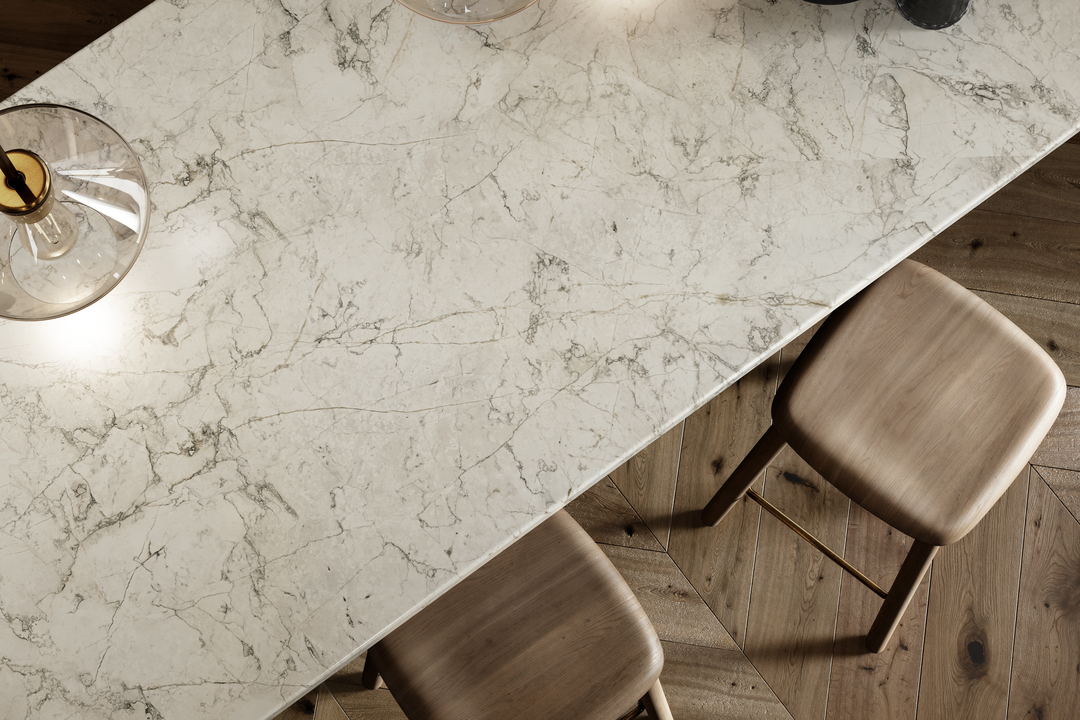 White marble surface with wooden stools